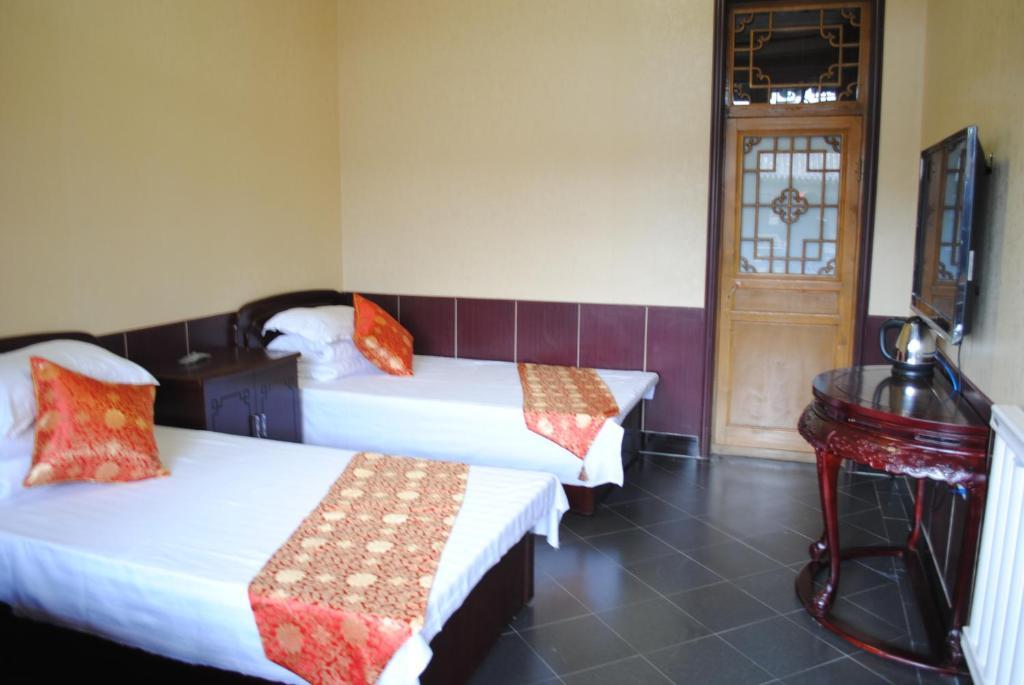 Pingyao Hong Jin Tai Fork Inn Part B ห้อง รูปภาพ